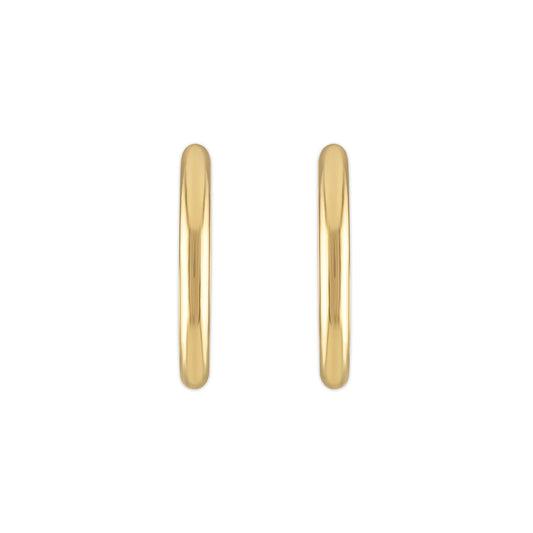 Gold hoop earrings on a white background