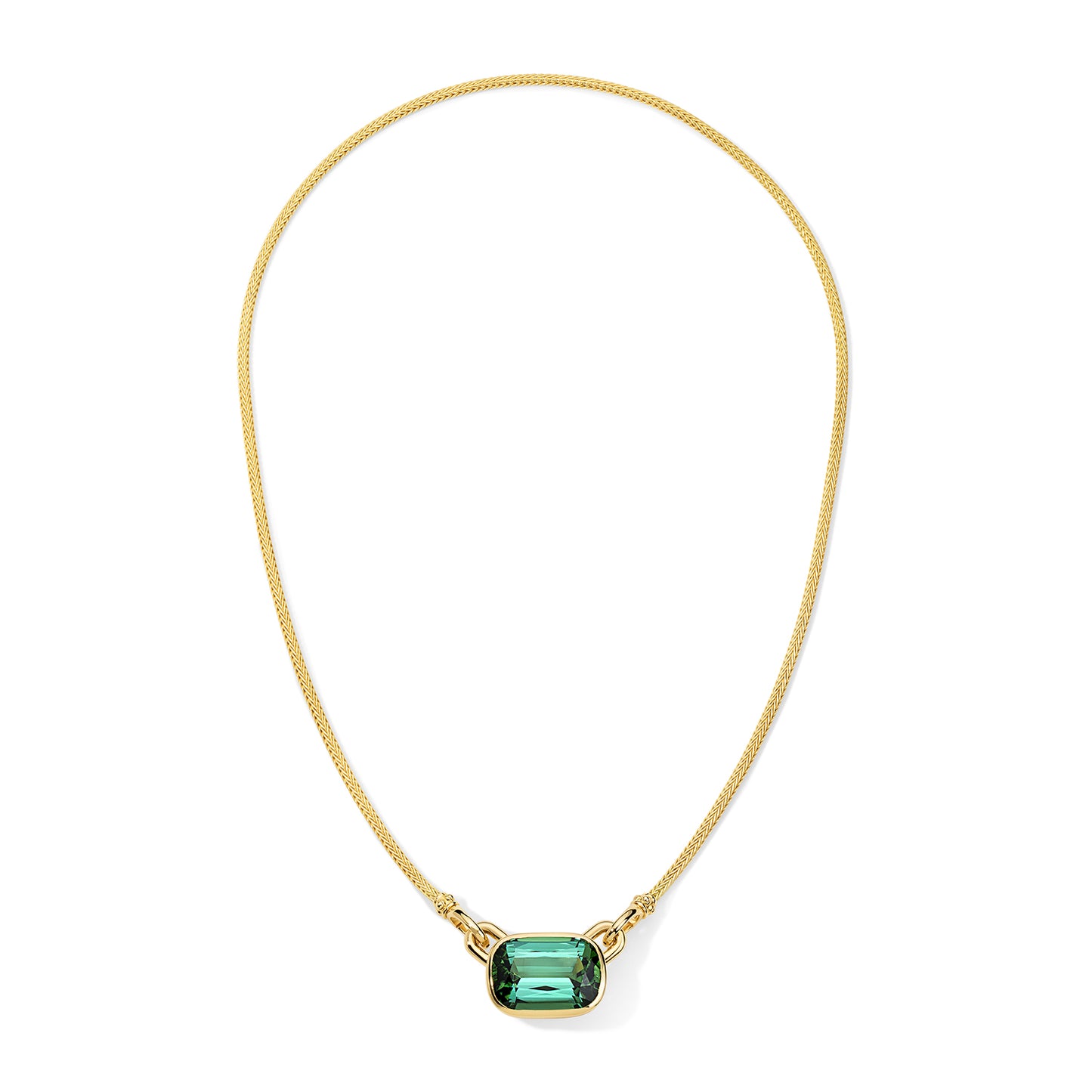Gold necklace with a green gemstone on a white background